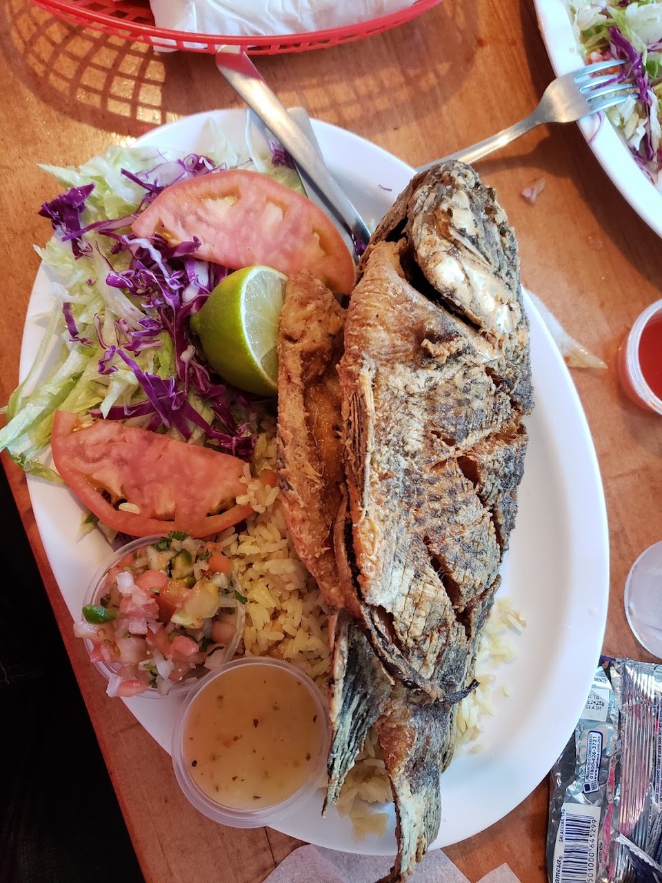 Printed menu with seafood and Mexican dishes.
